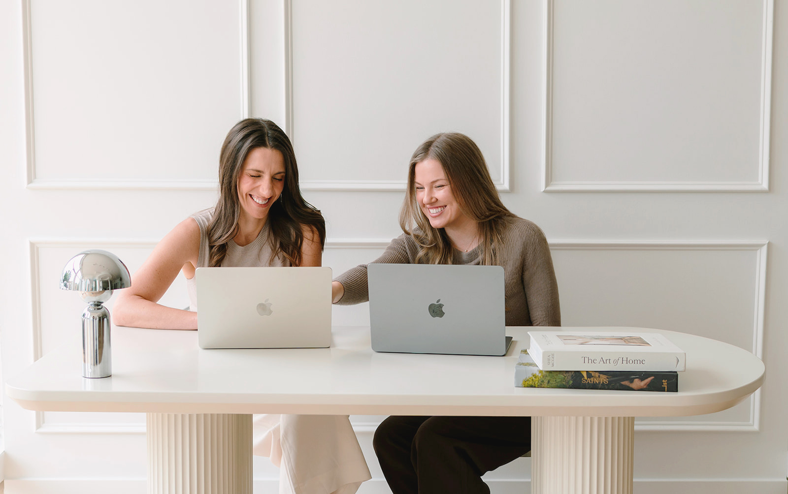 Lizzy and Hannah working together at LaRose & Co.